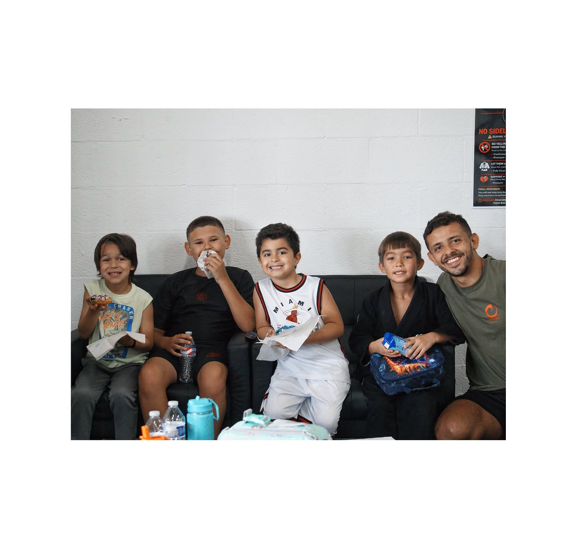 Traktion members hanging out together at the academy after training