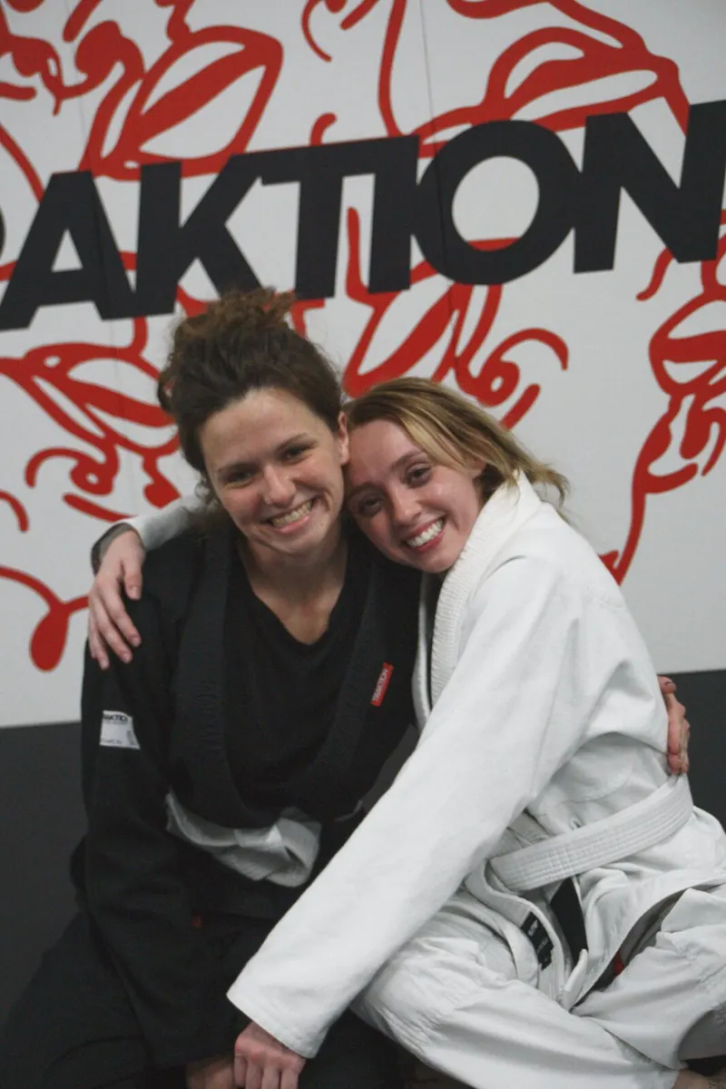 Adults drilling technique together in class at Traktion Jiu Jitsu